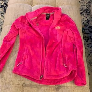 Women’s fuzzy pink North Face.